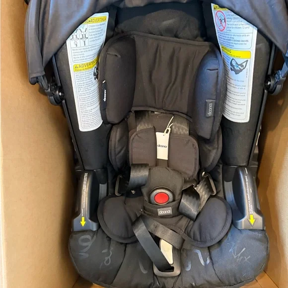 Doona Infant Car Seat & Stroller in Black with Yellow Accents - Picture 9 of 9